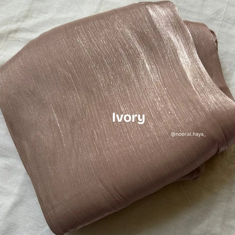 2 meter lvory shimmer organza hijab by Noor Al Haya