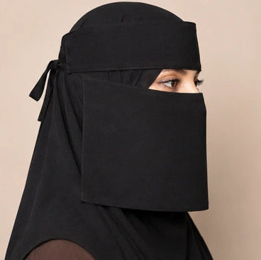 a model wearing 7-12 saudi niqab by noor al haya