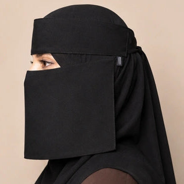 a model wearing 7-12 saudi niqab by noor al haya