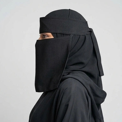 a women wearing 9'12 saudi niqab by noor al haya