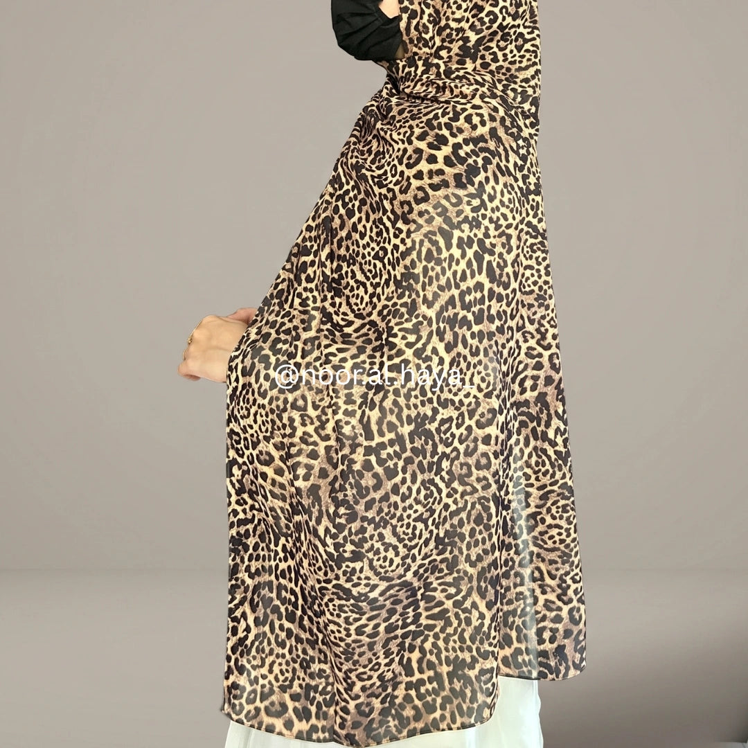 a women wearing cheetah print hijab by noor al haya
