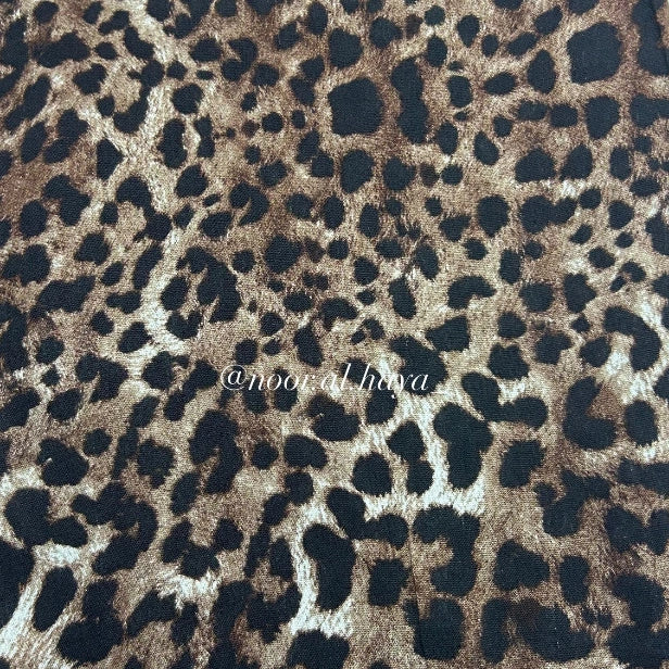 Close-up of classic leopard print pattern on a modal hijab by Noor Al Haya