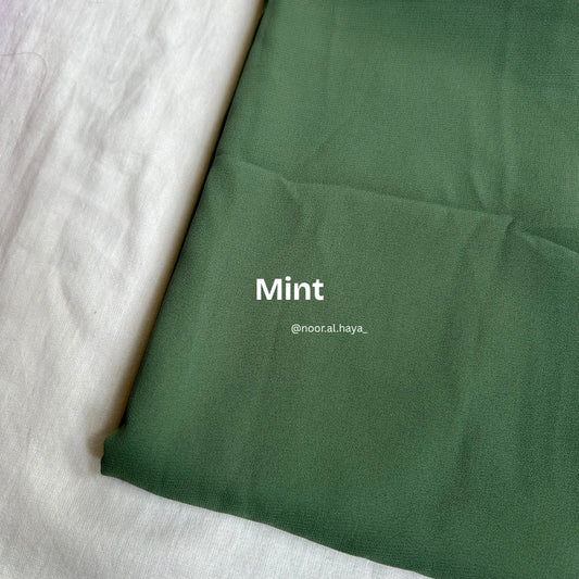 2 meter heavy Malaysian chiffon hijab in mint by Noor Al Haya