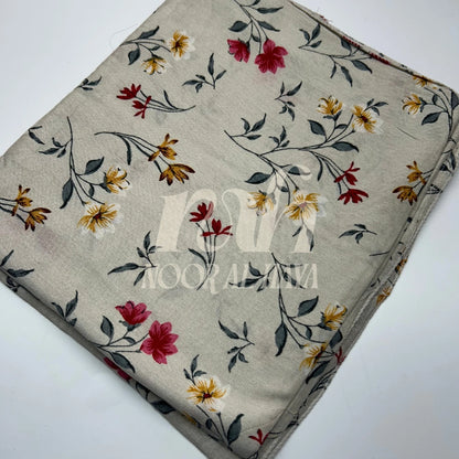 a close up photo ofice white floral printed hijab by noor al haya