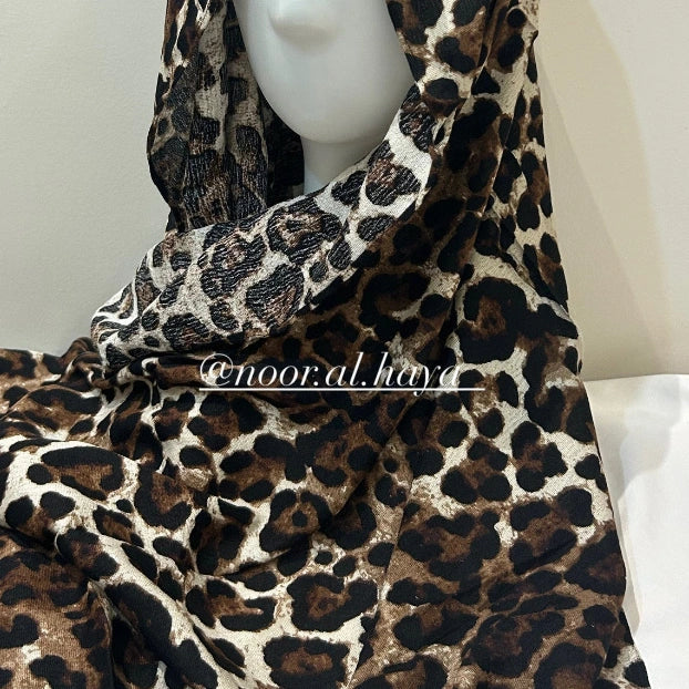 Leopard print modal hijab in a bold animal print design by Noor Al Haya