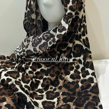 Leopard print modal hijab in a bold animal print design by Noor Al Haya