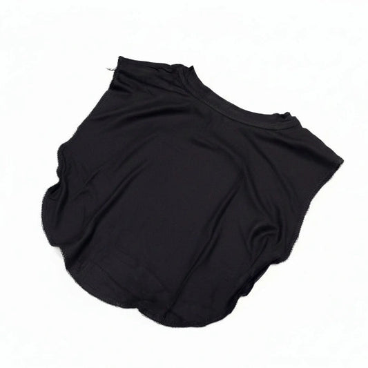 A black one-shoulder knit top or dress, shown flat on a white background by noor al haya