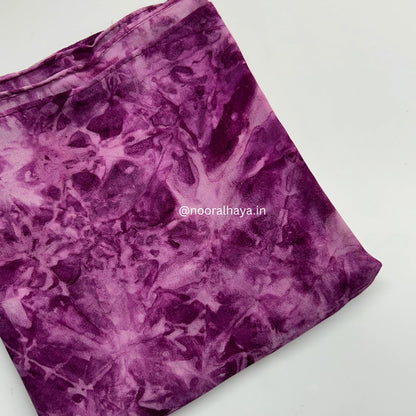 a close up shot of pink watermark hijab by noor al haya