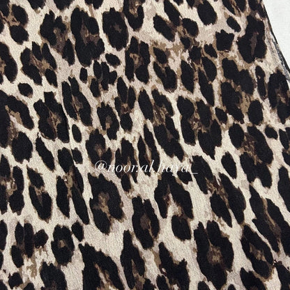 Close-up of snow leopard print pattern on a modal hijab by Noor Al Haya