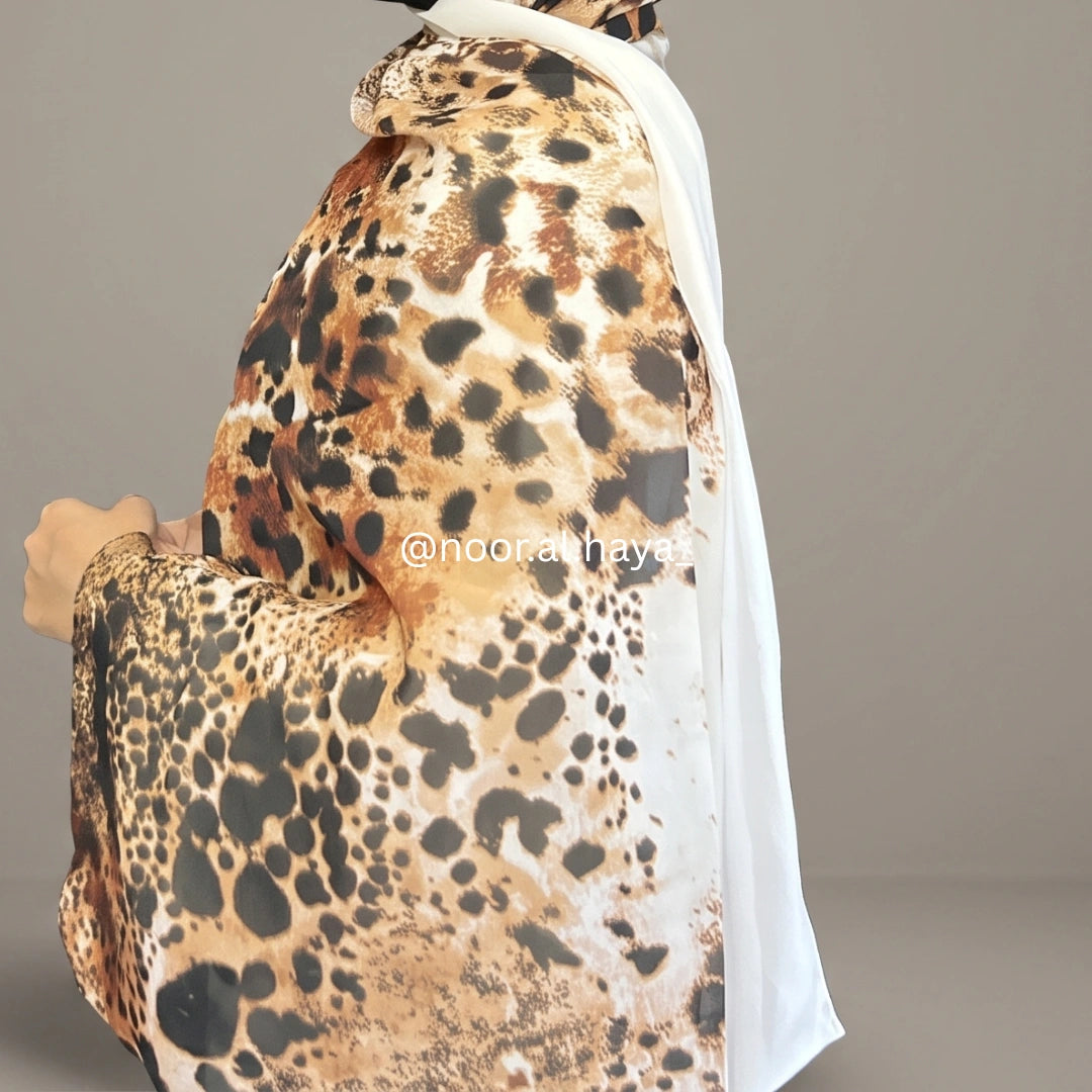 a women wearing tiger print hijab by noor al haya