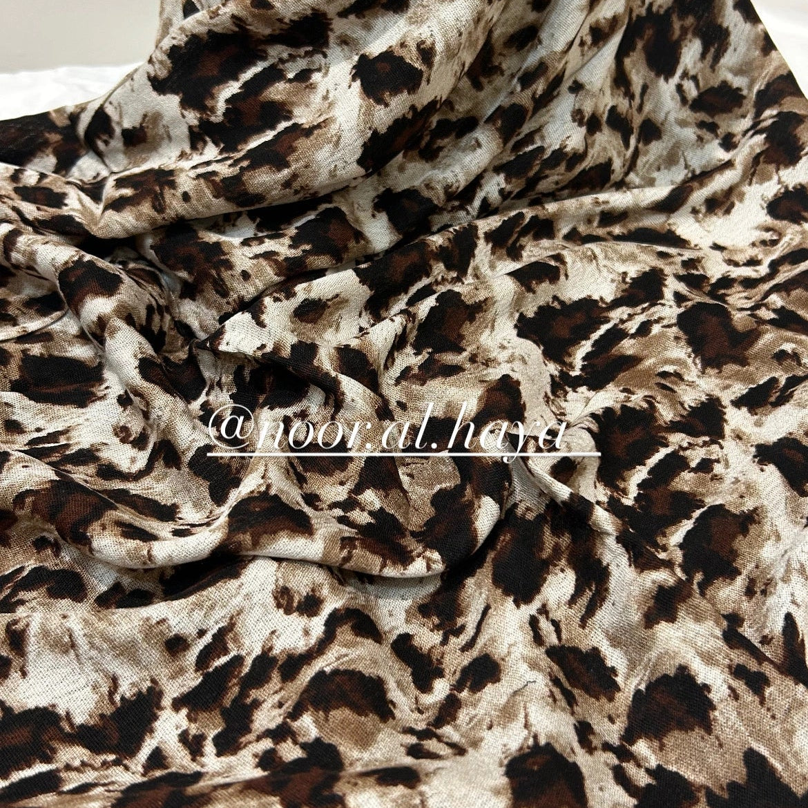 Close-up of tiger print pattern on a modal hijab by Noor Al Haya