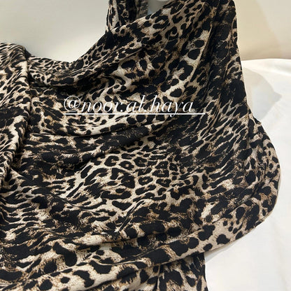 Close-up of wild animal modal print pattern on a modal hijab by Noor Al Haya