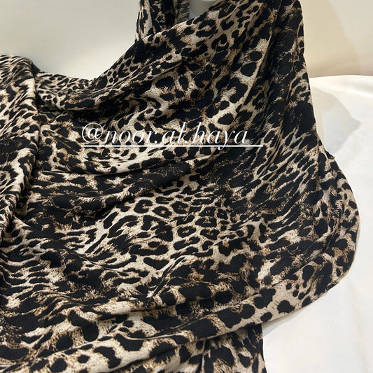 Close-up of wild animal modal print pattern on a modal hijab by Noor Al Haya